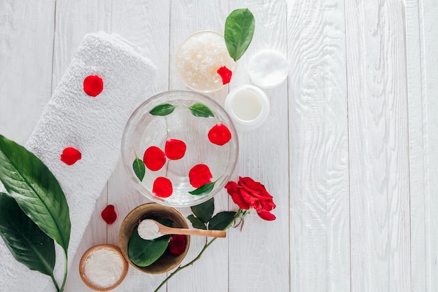 Spa essentials including candle salt roses and white clay