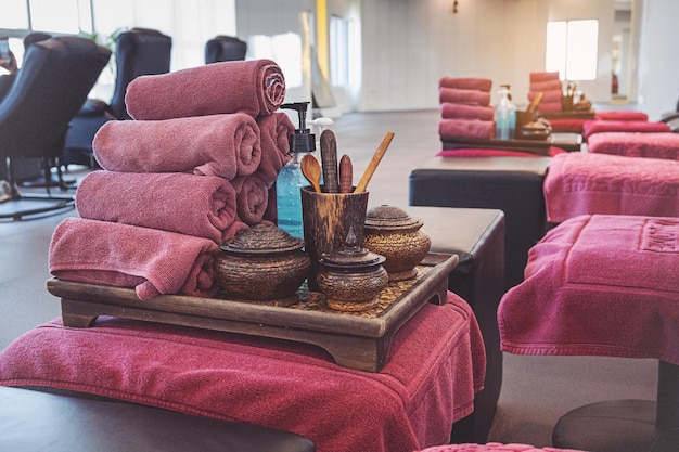 Spa treatment accessories with towel and aroma oil