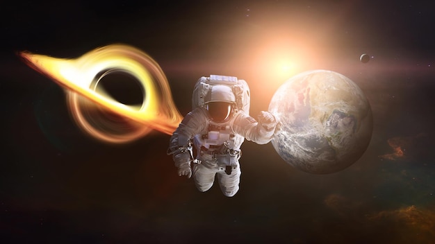 Spaceman in outer space with black hole and Earth planet Elements of this image furnished by NASA