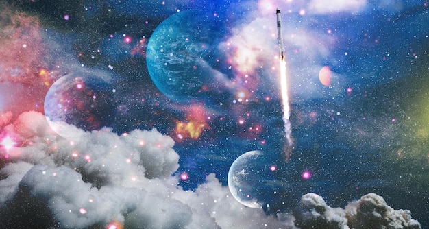 Spaceship flightSpace shuttle launch in the clouds to outer space Dark space with stars on background Elements of this image furnished by NASA