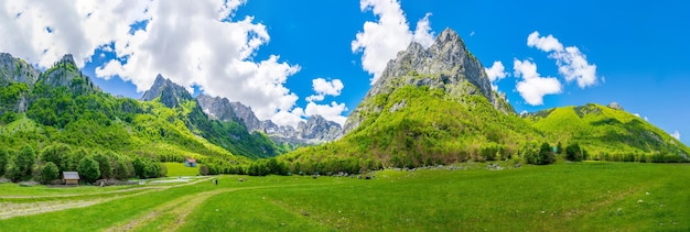 Spacious picturesque meadows among the huge mountains