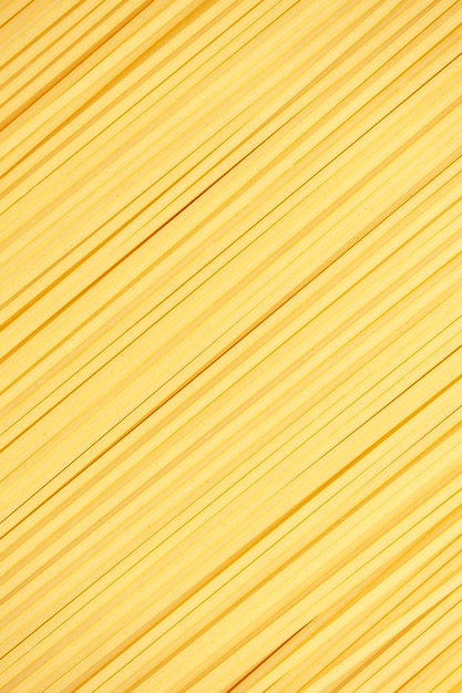 Spaghetti background. Top view. vertical photo