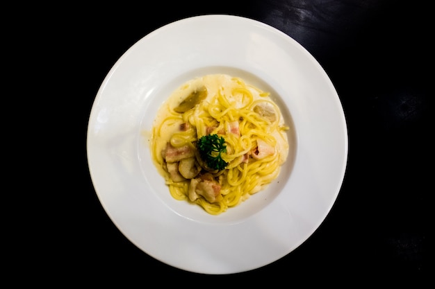 Spaghetti on a black background