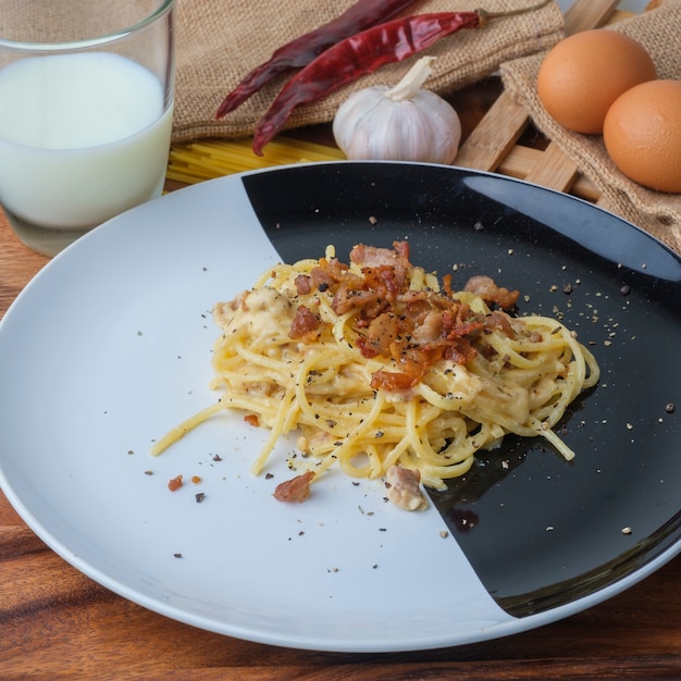 Spaghetti Carbonara,Carbonara pasta, hard parmesan cheese and cream sauce. Traditional italian cuisine.