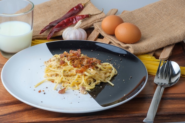 Spaghetti Carbonara,Carbonara pasta, hard parmesan cheese and cream sauce. Traditional italian cuisine.