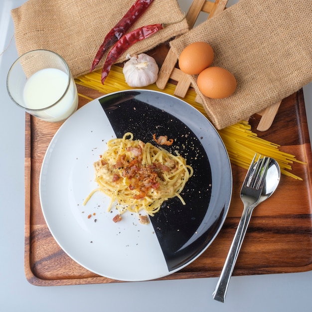 Spaghetti Carbonara,Carbonara pasta, hard parmesan cheese and cream sauce. Traditional italian cuisine.