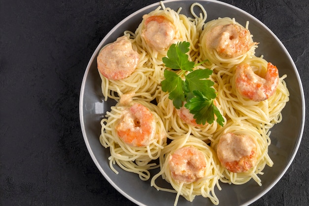 Spaghetti cream cheese white sauce with shrimp - Italian food style 
