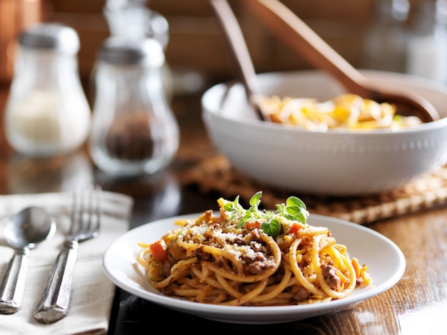 Spaghetti dinner with beef, parmesan and oregano