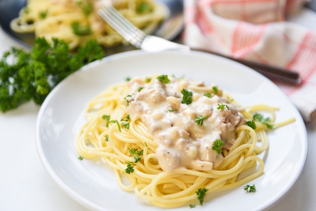 Spaghetti italian pasta served on white plate