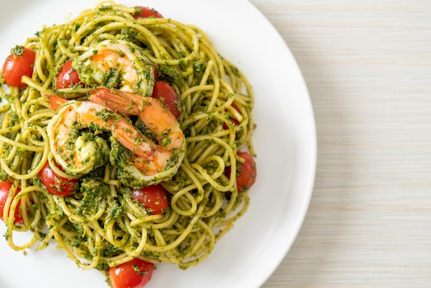 Spaghetti with prawns or shrimps in homemade pesto sauce