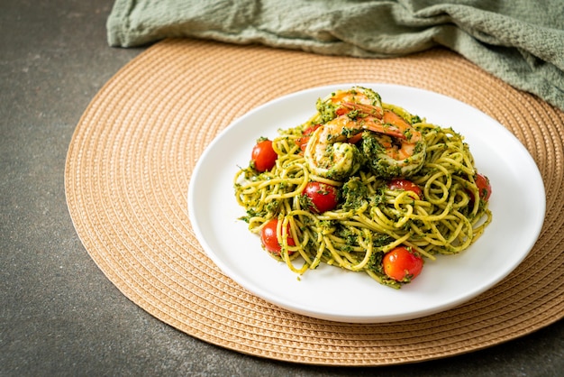 Spaghetti with prawns or shrimps in homemade pesto sauce