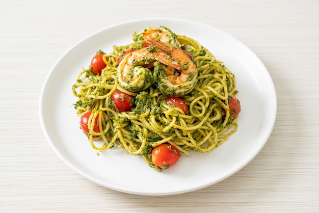 Spaghetti with prawns or shrimps in homemade pesto sauce