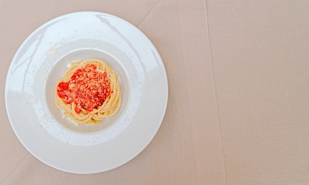 Spaghetti with tomato sauce and parmesan