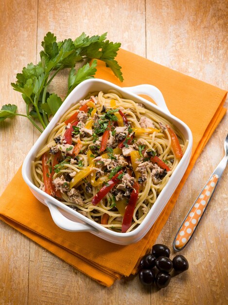 Spaghetti with tuna capers olives and peppers