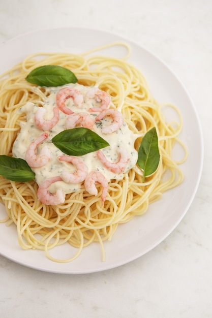 Spaghetti with white sauce and shrimps