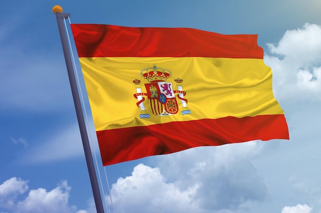 Spain flag on the sky background