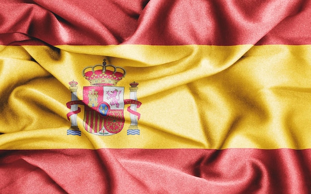 spain flag on wavy silk textile fabric background