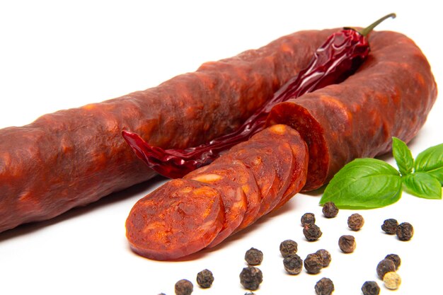 Spanish chorizo sausage on white background