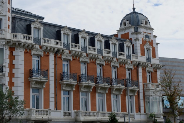 Spanish classical building windows balconies in modernist architectural style centre of Madrid Spain