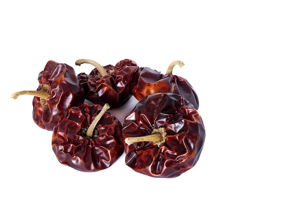 Spanish dried ñora nyora pepper on white background, top view