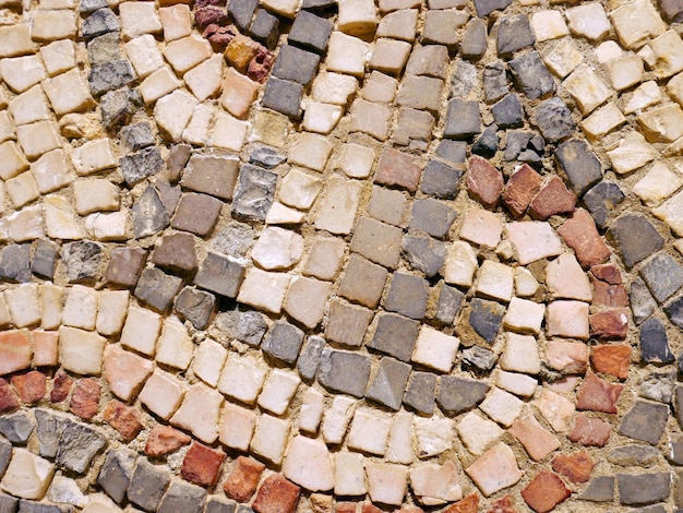 Spanish roman mosaic with circular graphic for floor decoration