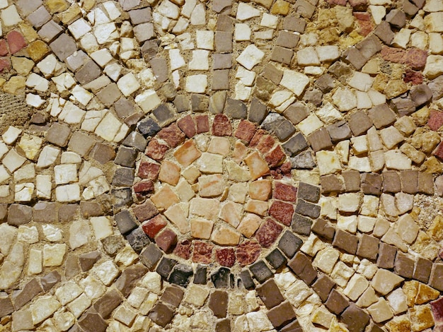 Spanish roman mosaic with circular graphic for floor decoration