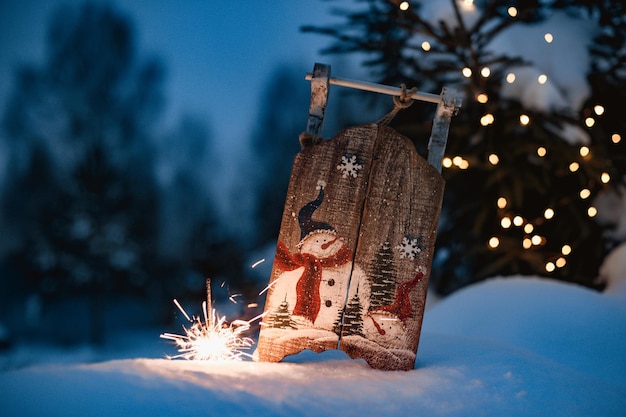 Sparkler in the snow in the evening