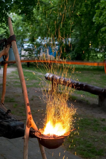 sparks of blacksmith fire in the darkxA