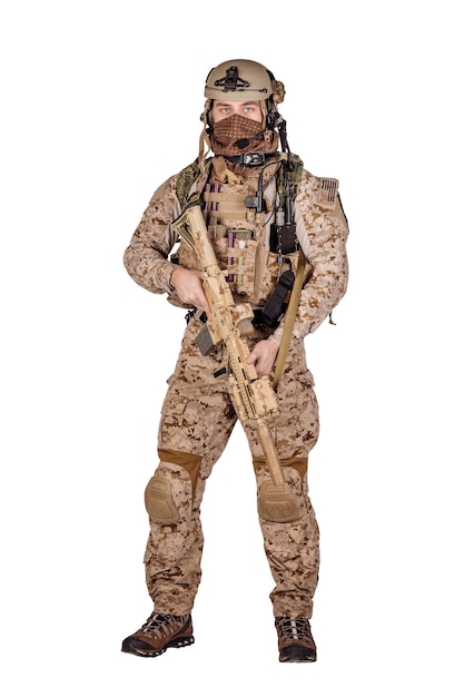 Special forces soldier with rifle on white background army military and people concept