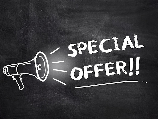 Photo special offer text with megaphone on chalkboard background