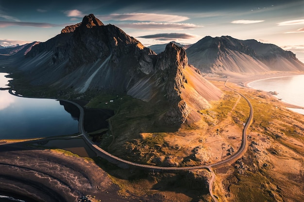 Spectacular Mount Eystrahorn in the Krossasnesfjall mountain range and sunlight shine in the morning on coastline in summer at East of Iceland