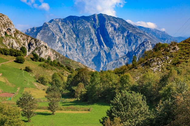 Spectacular view of the Picos de Europa National Park from Tresviso (Cantabria - Spain). Postal of mountain, valley and town.