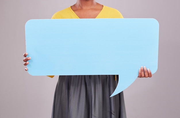 Speech bubble woman and mockup with social media and announcement with news isolated on studio background Voice feedback and female model with communication poster with sign and branding promo