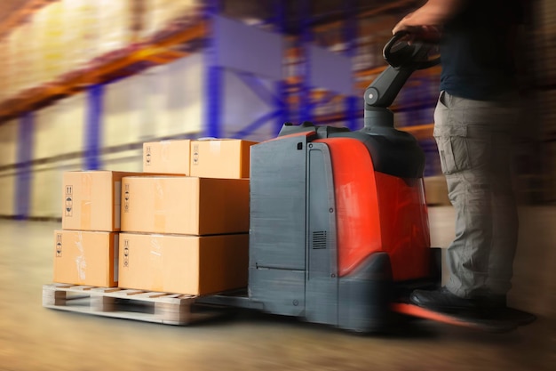 Speed Motion of Workers Unloading Package Boxes on Pallets in Storage Warehouse