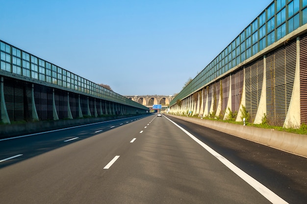 Speed road freeway in Germany with high walls on the sides