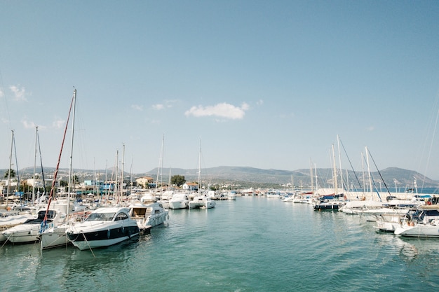 Speedboats and yachts in the parking lot. Cuprus, Paphos, blue lagoon side view