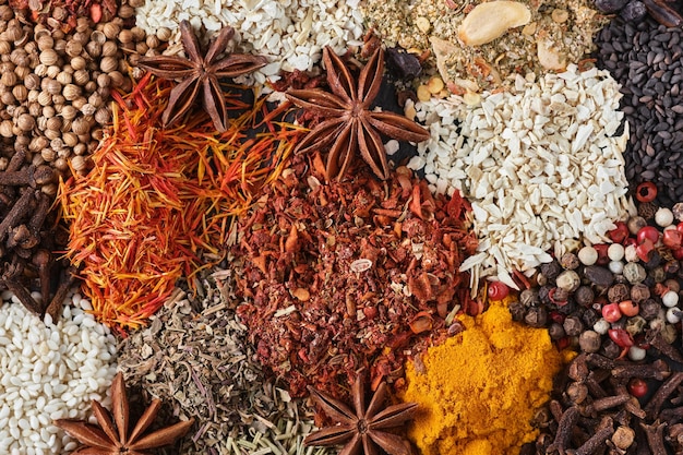 Spices Aromatic Indian spices as background Spices and herbs on a stone background