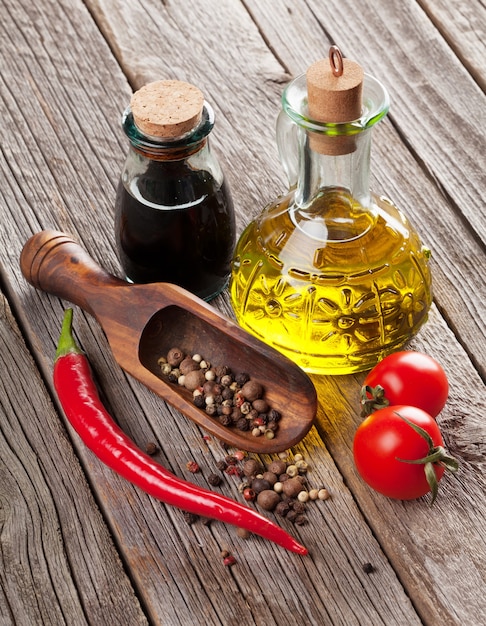 Spices and condiments on wooden table