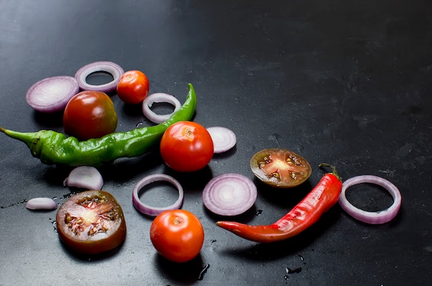 Spices and herbs for cooking dinner - ,slised tomato, onion, salt, pepper, garlic. 