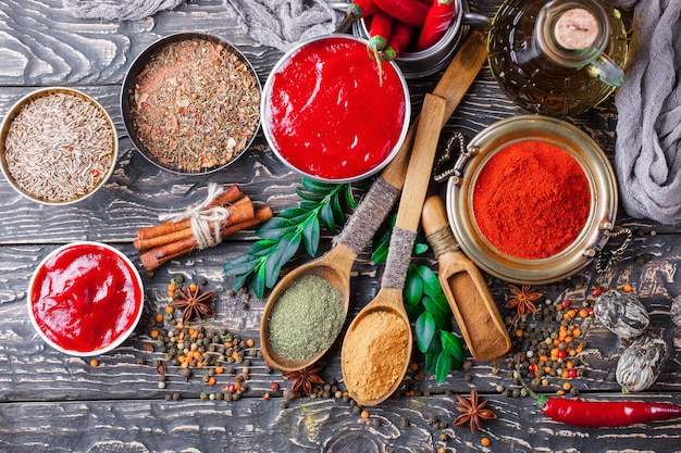 Spices and seasonings on a wooden table