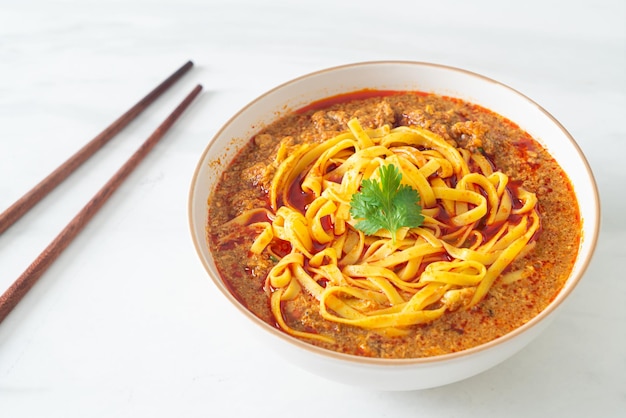 Spicy Chinese Yunnan Noodles Soup or Kwa Meng