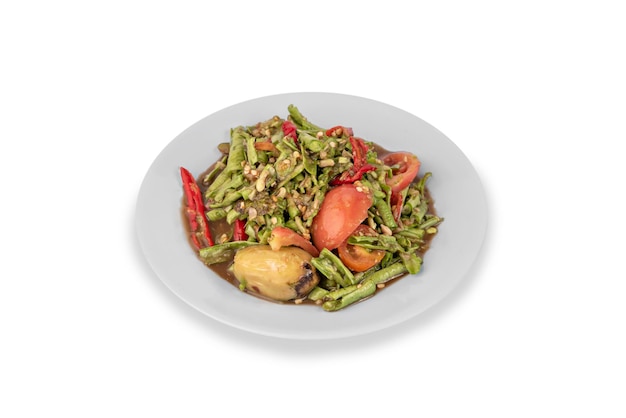 Spicy cowpea salad on plate over white background  asian cuisine