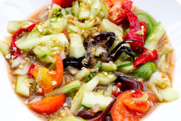 Spicy cucumber salad in plate