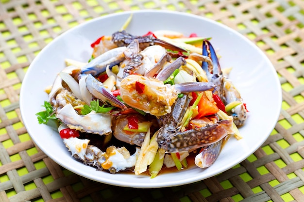 Spicy green mango salad with blue crab