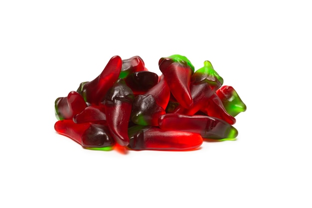 Spicy jelly sweets isolated on white surface. Candy pepper.