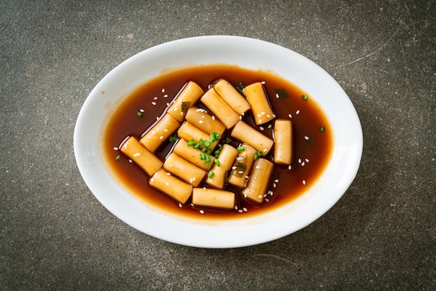 Spicy Jjajang Tteokbokki or Korean rice cake in spicy black bean sauce