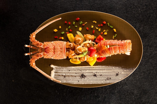 Spicy lobster tornado served in dish isolated on background top view of chinese food