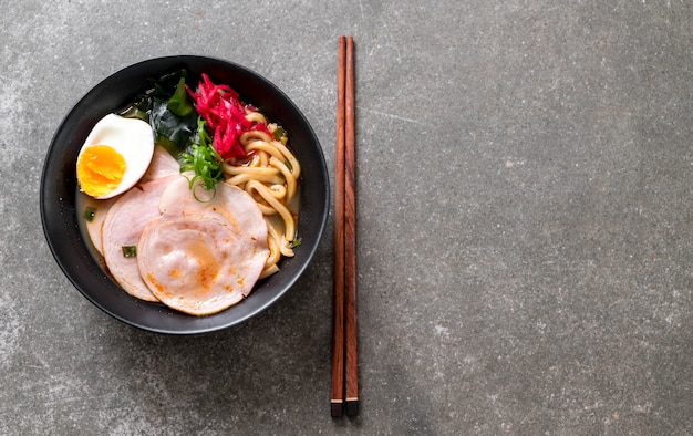 spicy miso udon ramen noodle with pork, copyspace