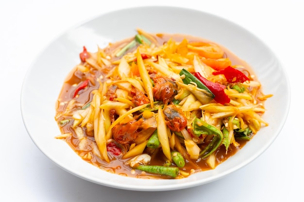 Spicy papaya salad with pickled shells