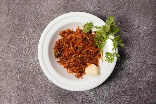 Spicy Piyaj Morich Bhorta Chili Onion served in dish isolated on background top view of bangladesh food